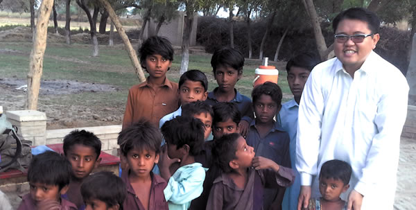 Elbert working with children